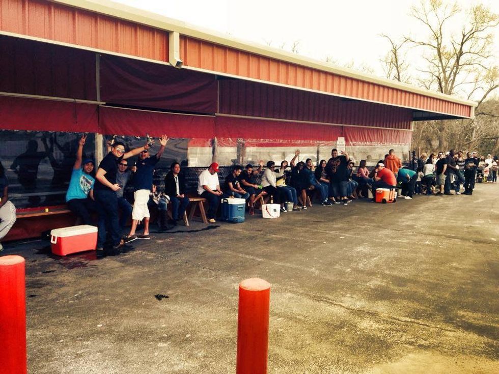 A line of people wait at the Crawfish Shack in Crosby