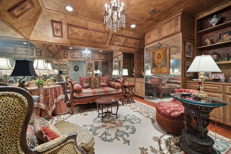 A living room and gathering space of 412 Timberwilde Lane