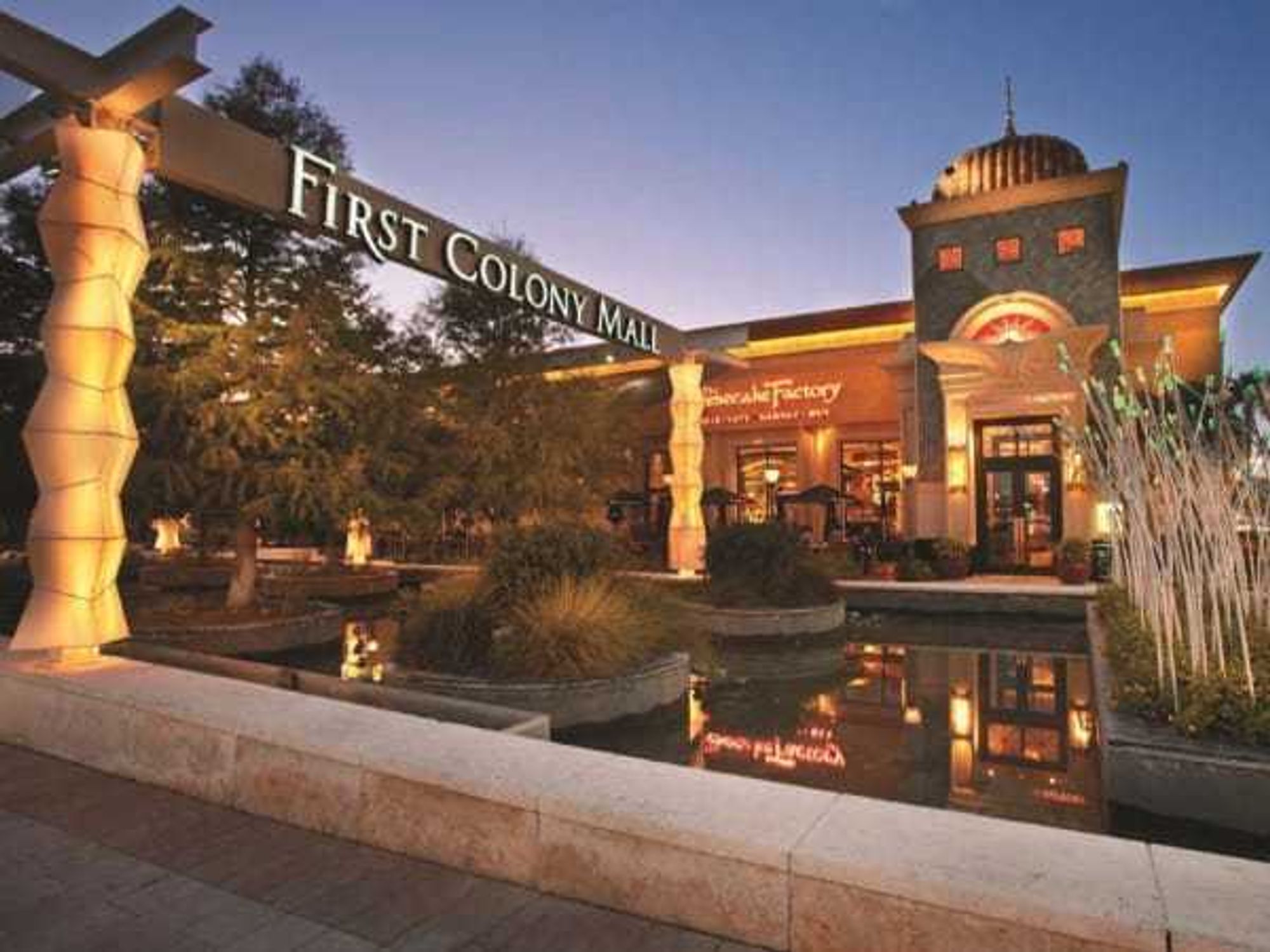 A shot of the entrance to the First Colony Mall in Sugar Land with the Cheesecake Factory in the background.