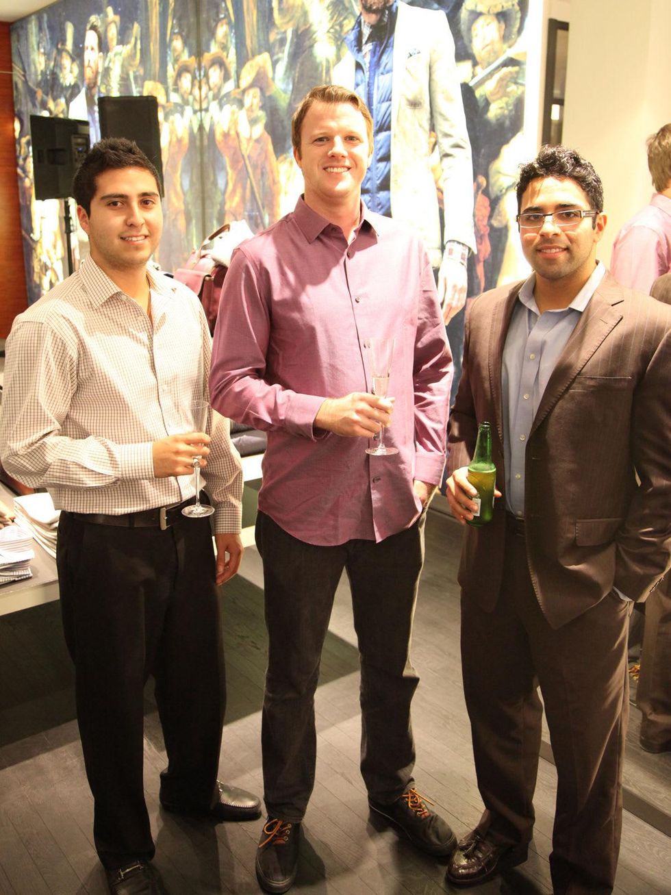 Aaron Garza, from left, Billy Bettingen and Atta Shay at the Suitsupply Houston grand opening party December 2013