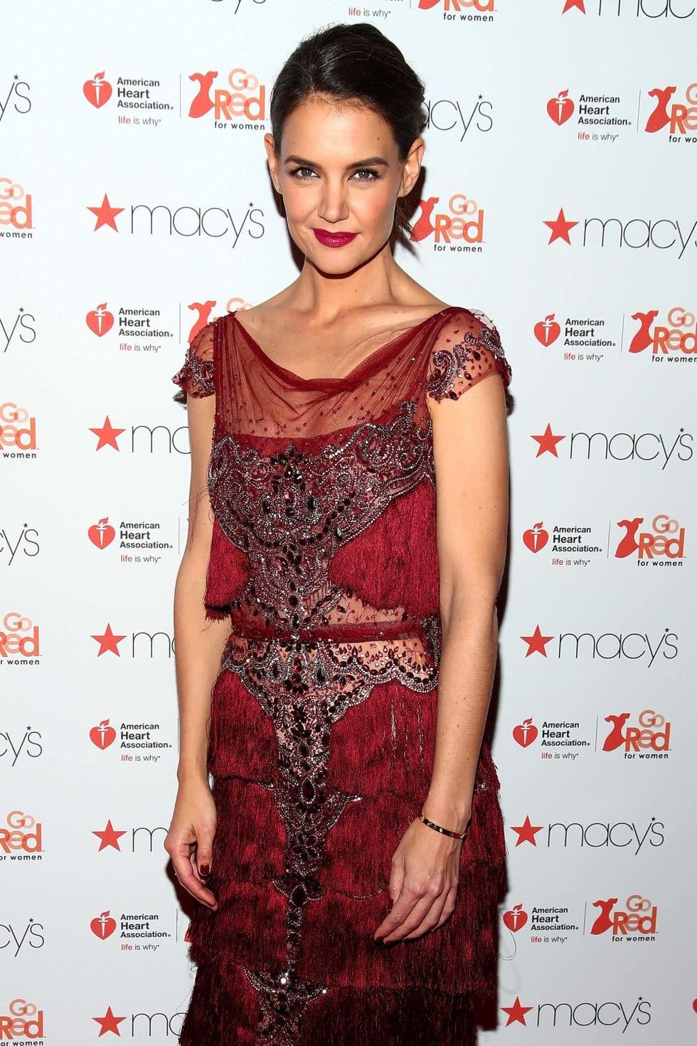 Actress Katie Holmes attends the American Heart Association's Go Red For Women Red Dress Collection 2017 p