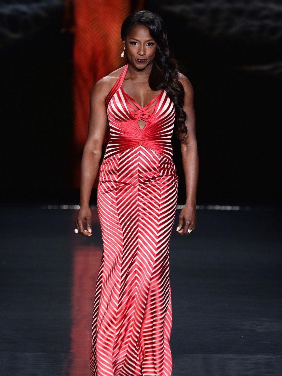Actress Rutina Wesley, wearing Max Azria, walks the runway at Go Red For Women - The Heart Truth Red Dress Collection 2014 Show February 2014