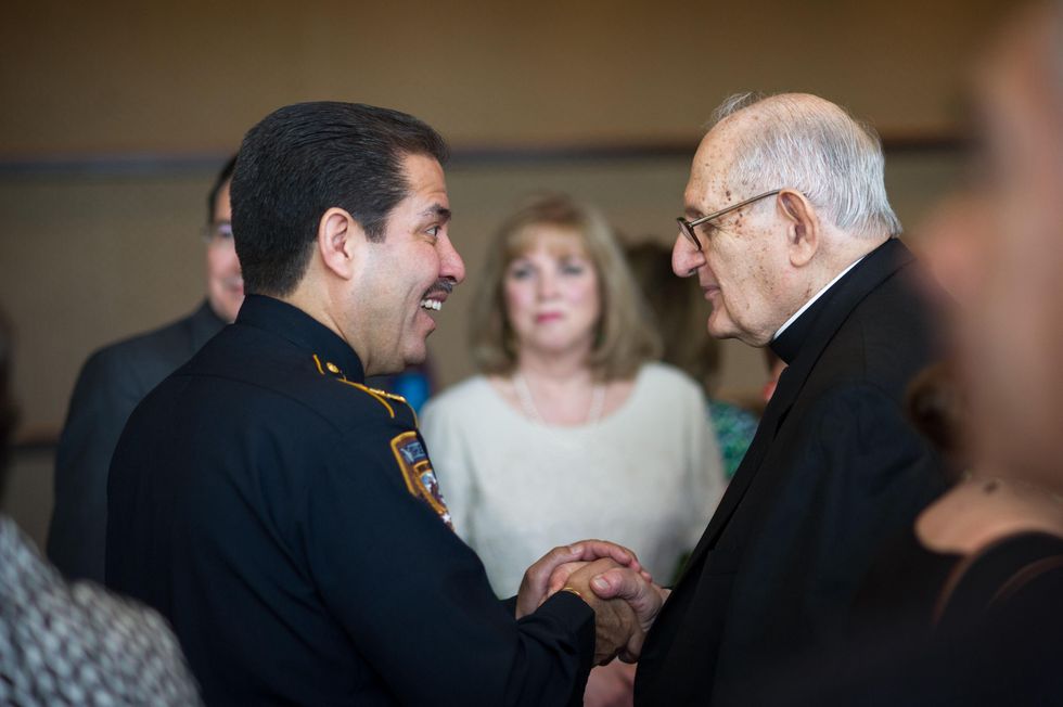 Adrian Garcia, left, and Archbishop Joseph Fiorenza at the CHRISTUS Foundation for HealthCare spring luncheon April 2015