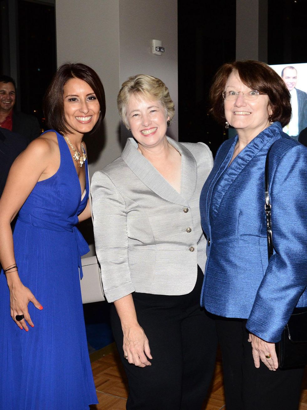 Alejandra Rutledge, from left, Mayor Annise Parker and Kathy Hubbard at Alex Martinez's birthday party July 2014