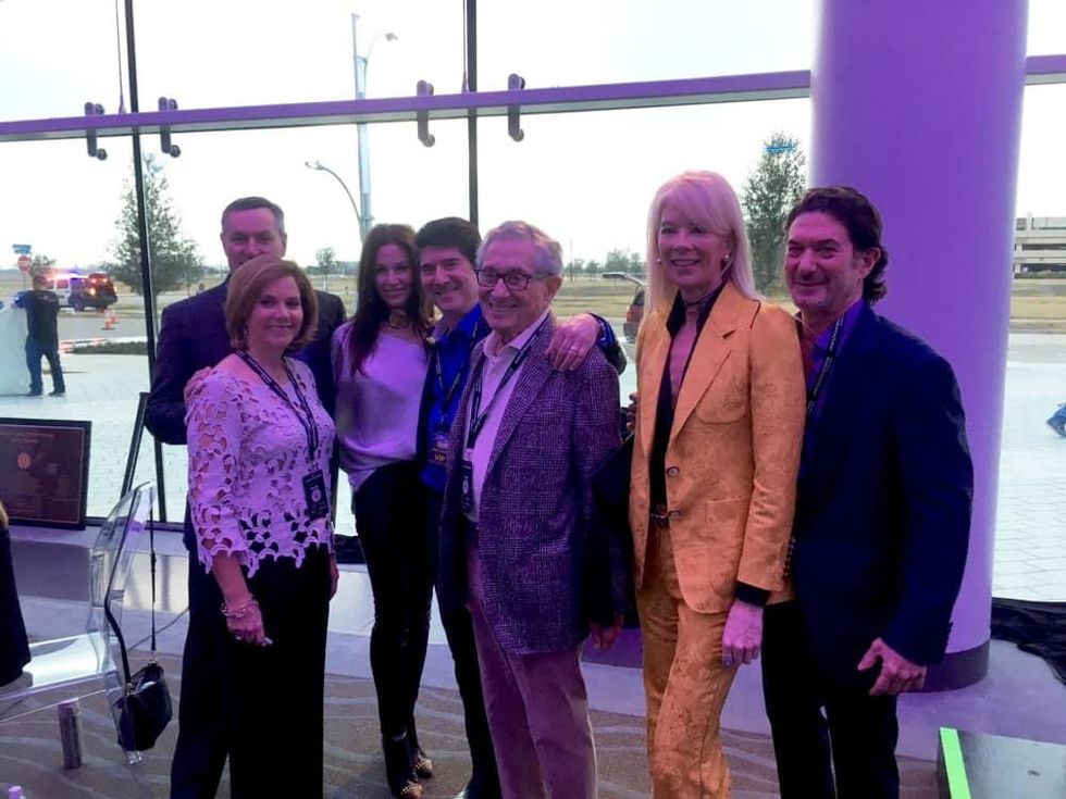 Allen Becker, Brian Becker and Gary Becker celebrating opening of Smart Financial Centre