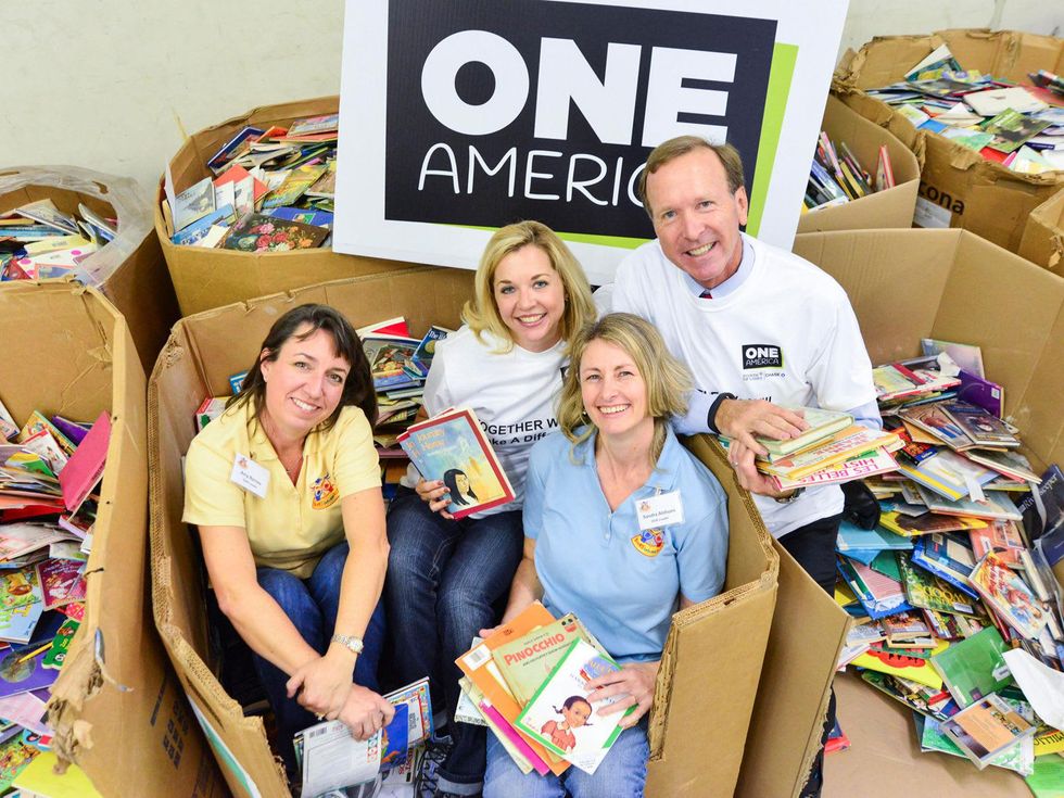 Amy Barnes, from left, Julie Baker, Sandra Ahlhorn and Neil Bush at the Books Between Kids project November 2013