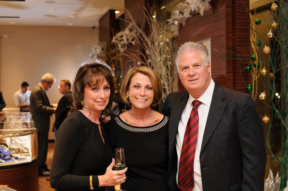 Angie Forester, from left, with Beth and Gerald Eaton at the Thomas Markle Jewelers grand opening at Gateway Memorial City December 2014