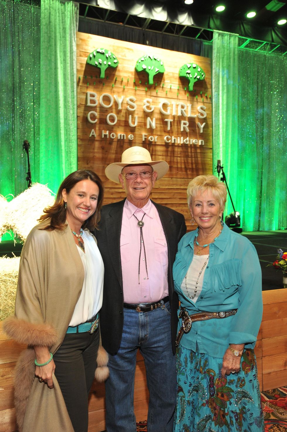 Anna-Laure Stephens, from left, with Walter and Yvonne Johnson at the Boys and Girls Country Gala November 2014