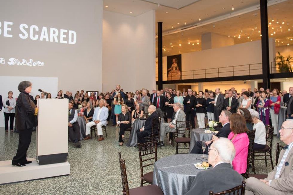Anne Wilkes Tucker address audience at Museum of Fine Arts