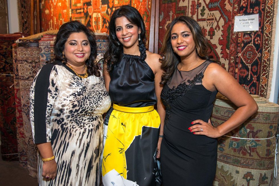 Annie Thomas, from left, Elizabeth Abraham and Rachel Duvvuri at the Abraham's Oriental Rug dinner September 2014