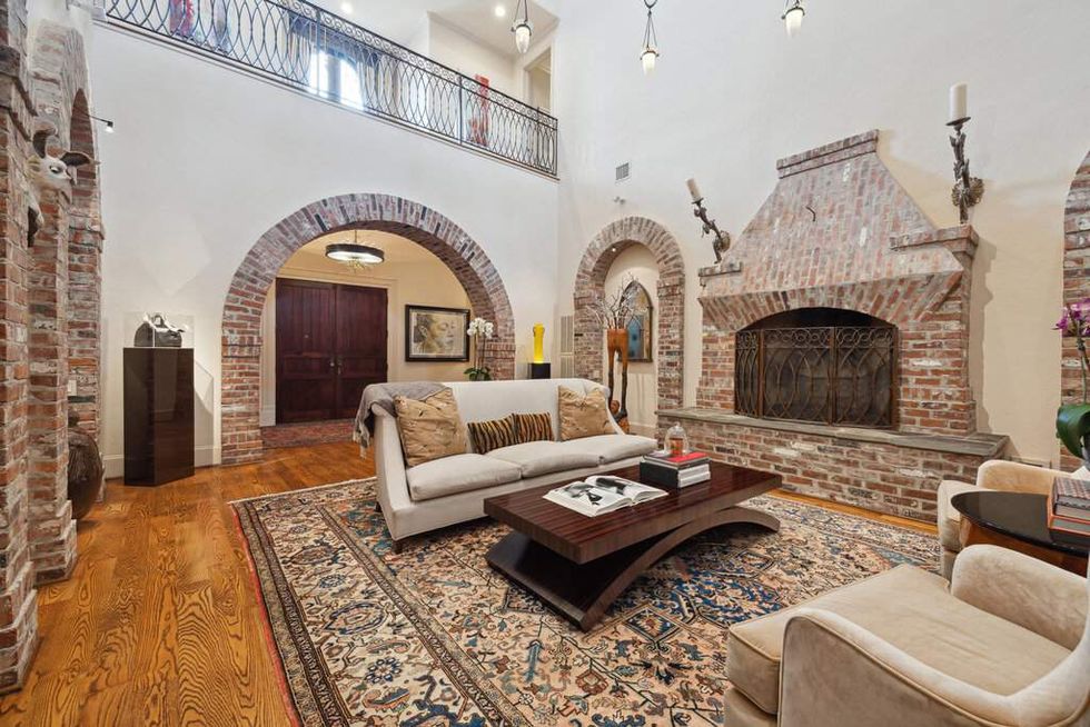 Another view of the living room looking toward the front doors of 3207 Sackett St.