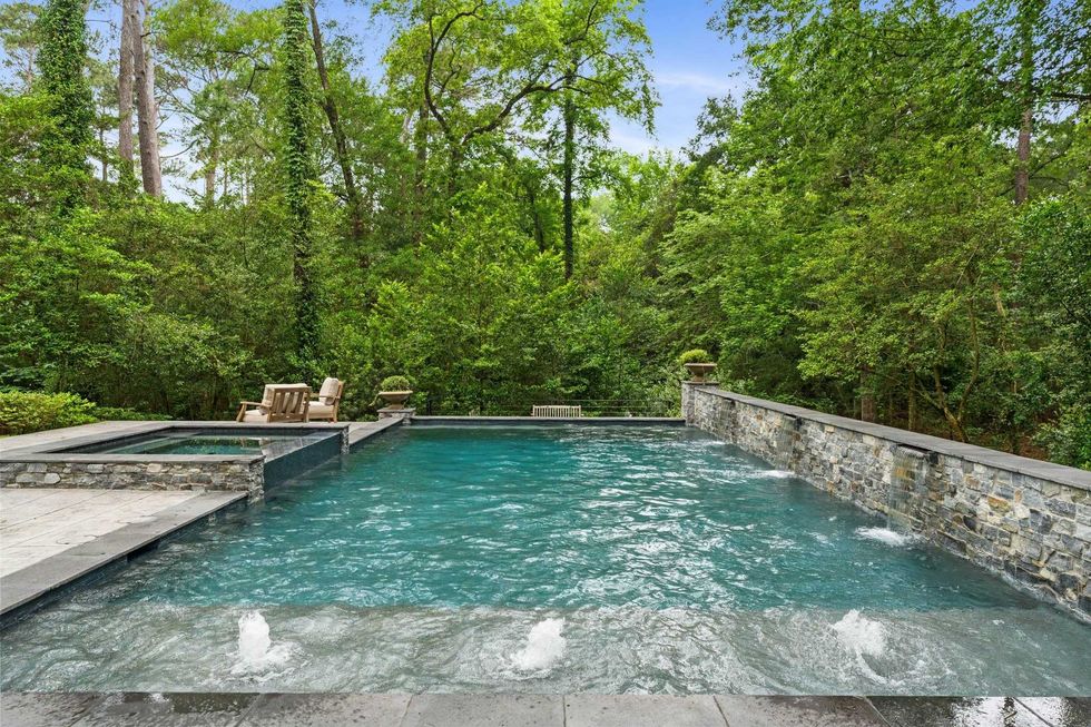 Another view of the pool and spa of 23227 Brownwood Lane in Tomball