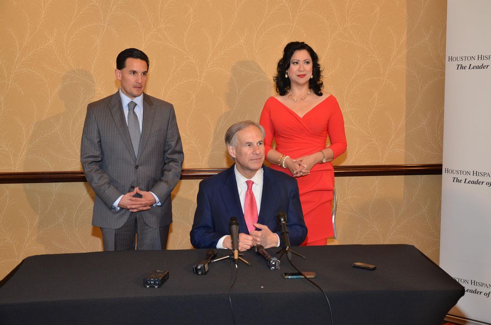 Armando Perez, from left, Greg Abbott and Dr. Laura Murillo at the Houston Hispanic Chamber of Commerce luncheon & business expo April 2015