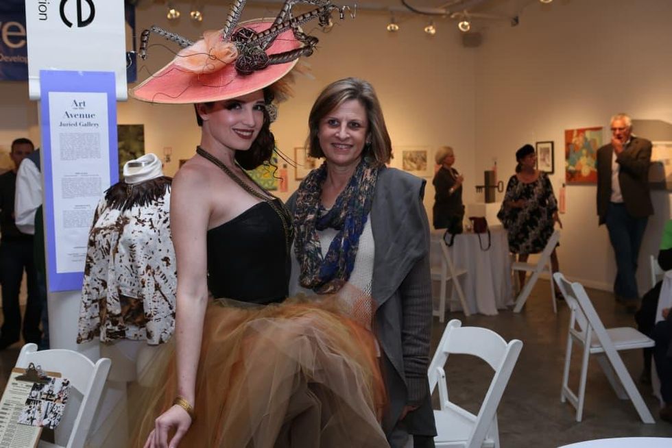 Art on the Avenue Model Stephanie Long shows off Violet Peacock\u2019s design while posing with Dianne Webb