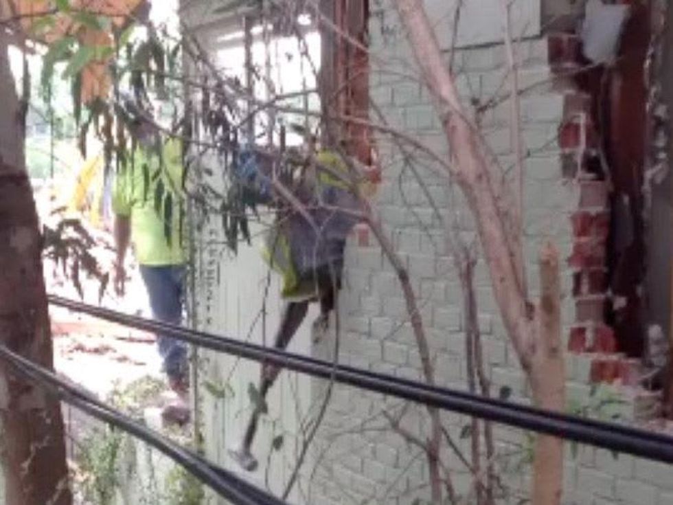 Ashby Highrise demolition men working May 2013