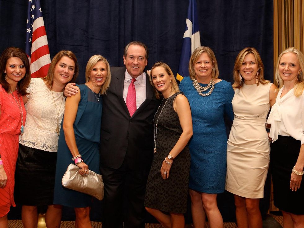Ashley Stevens, from left, Kathryn Roark, Paige Lane, Mike Huckabee, Allison Stasney, Mary Clark Granberry, Cecie Turlington and Laurence Bragg at the LifeHouse fundraiser October 2013