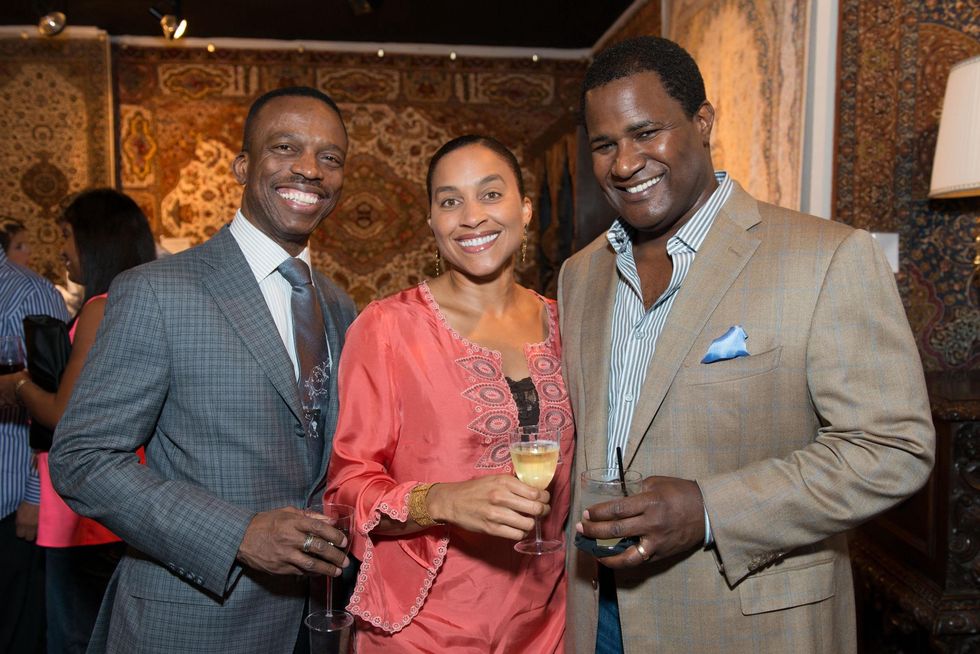 Astley Blair, from left, with Siva and Teddy Adams at the Abraham's Oriental Rug dinner September 2014