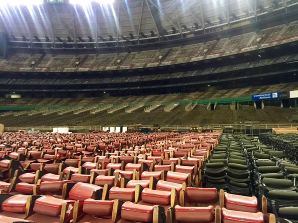 Astrodome public tour 50th anniversary party April 2015 Astrodome public tour 50th anniversary party April 2015 A sea of seats on the ground and none in the the stands.