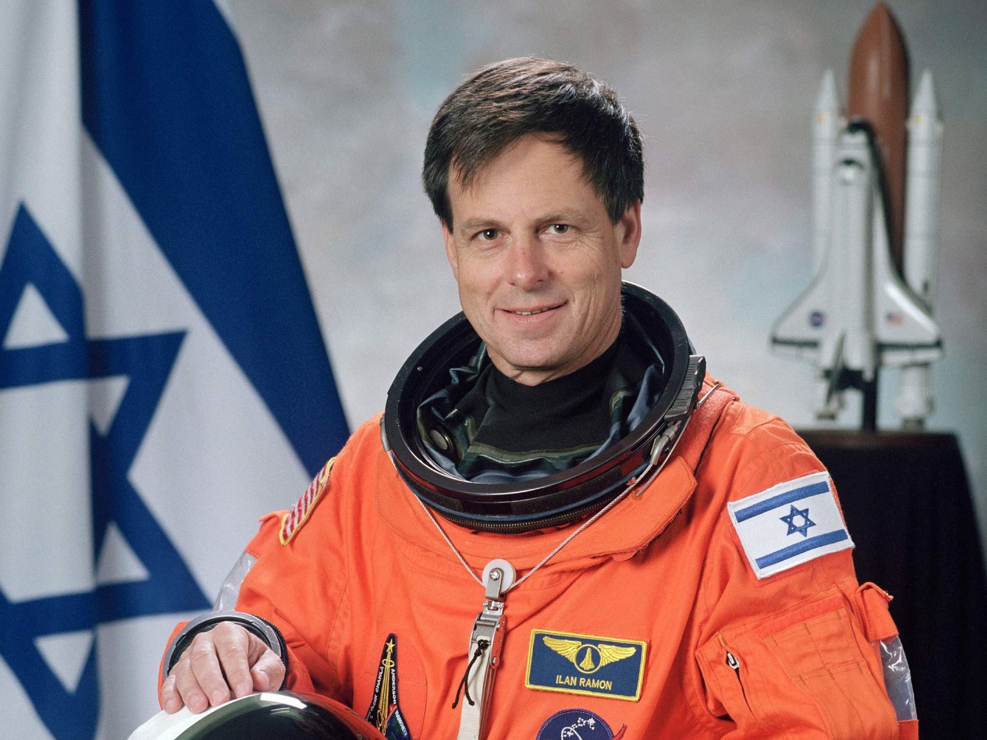 Astronaut Ilan Ramon in an orange jumpsuit at NASA