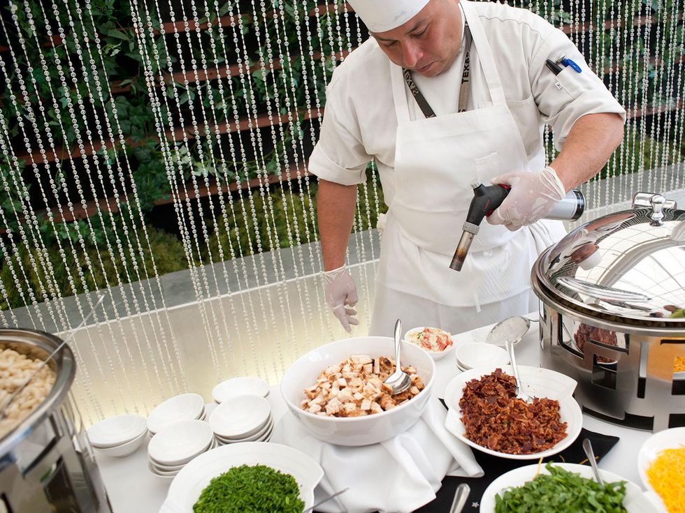 Astronaut Wives Club launch event June 2013 Sam Houston Hotel employee at Macaroni & Cheese bar