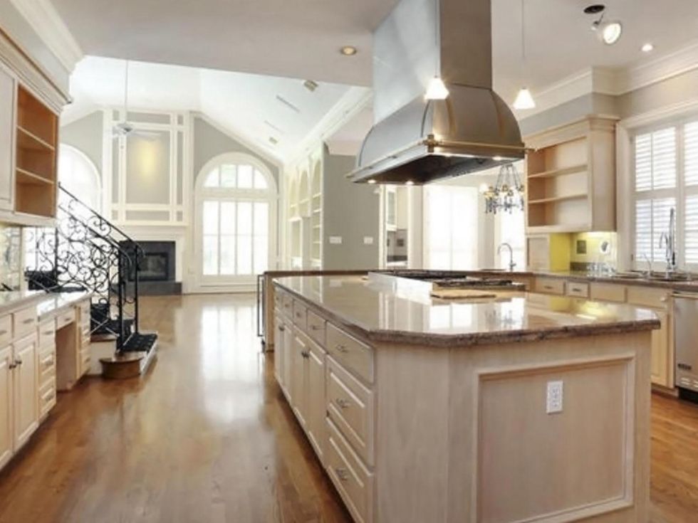 Astros $100 million man Carlos Lee sells Sugar Land mansion November 2014 kitchen to living room