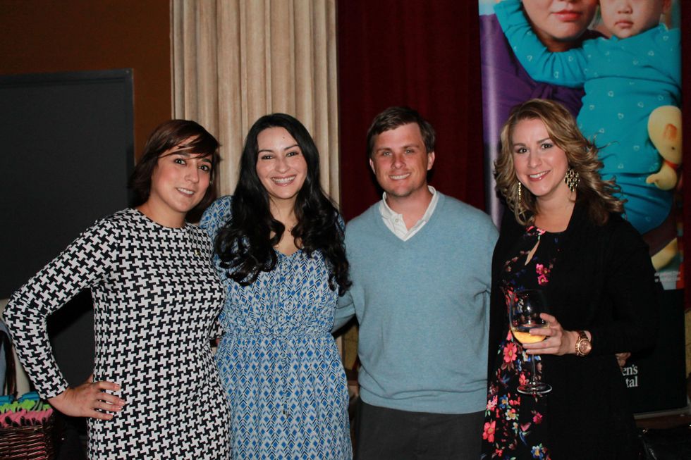 Audrey Luttmann, from left, Rosie Murphy, Corbett Parker and Sarah Johnson at the Friends of St. Jude Spring Happy Hour March 2015
