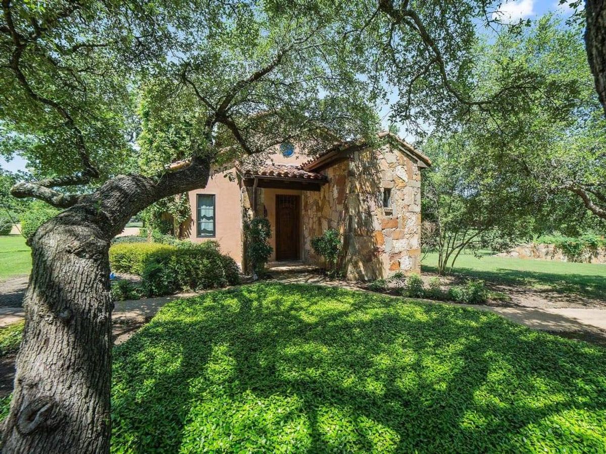 The property has a separate guest cottage. - CultureMap Houston