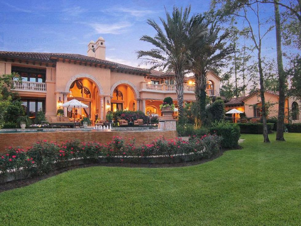 Avery Johnson mansion for sale The Woodlands Spring June 2013 back exterior night