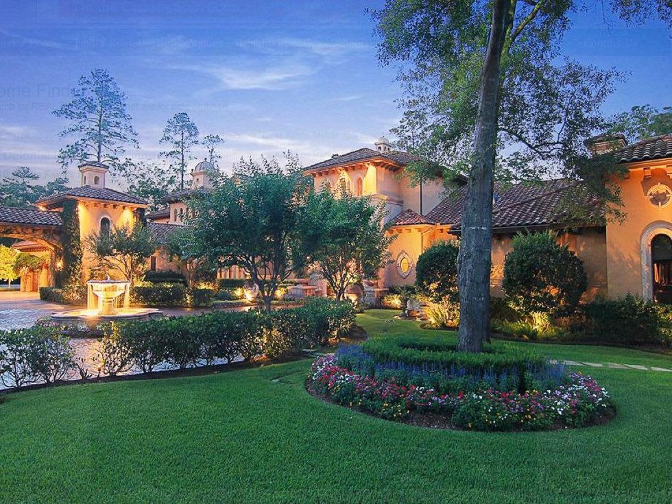 Avery Johnson mansion for sale The Woodlands Spring June 2013 house exterior side view at night