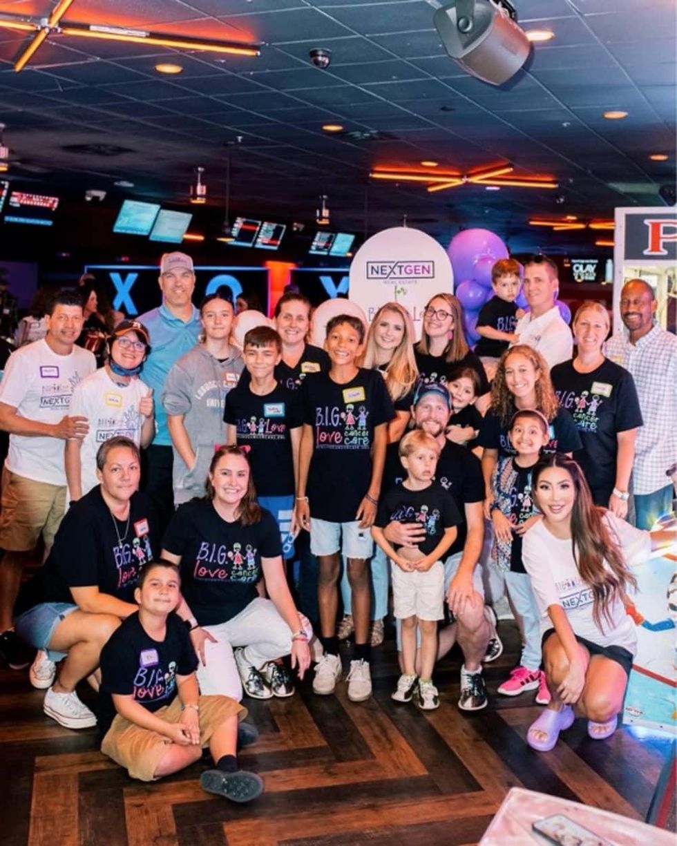 B.I.G. Love Cancer Care families attend a bowling fundraiser organized by NextGen Real Estate.