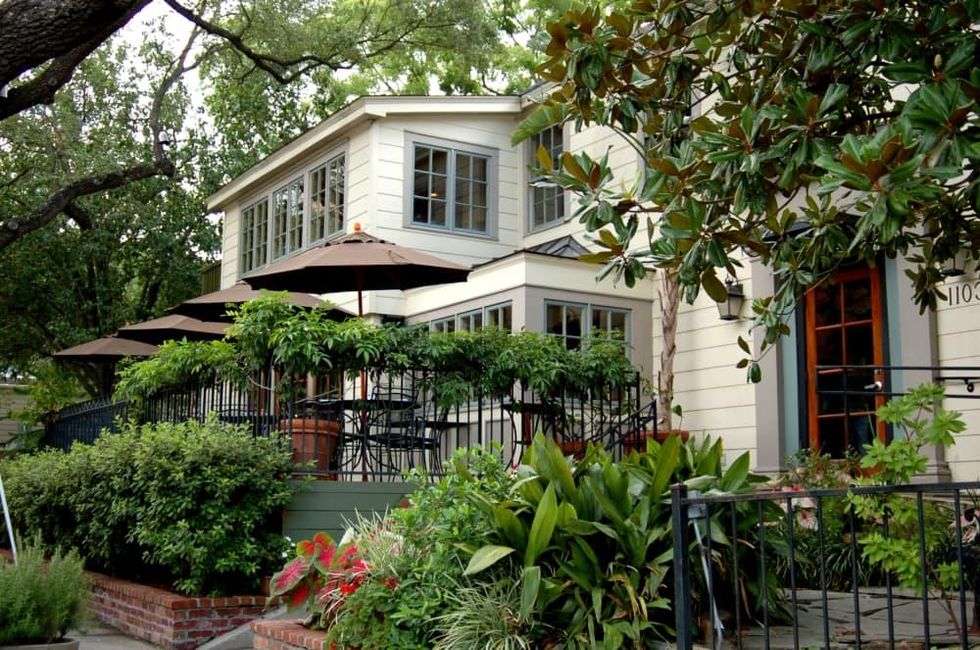 Backstreet Cafe restaurant Houston exterior day with patio and umbrellas