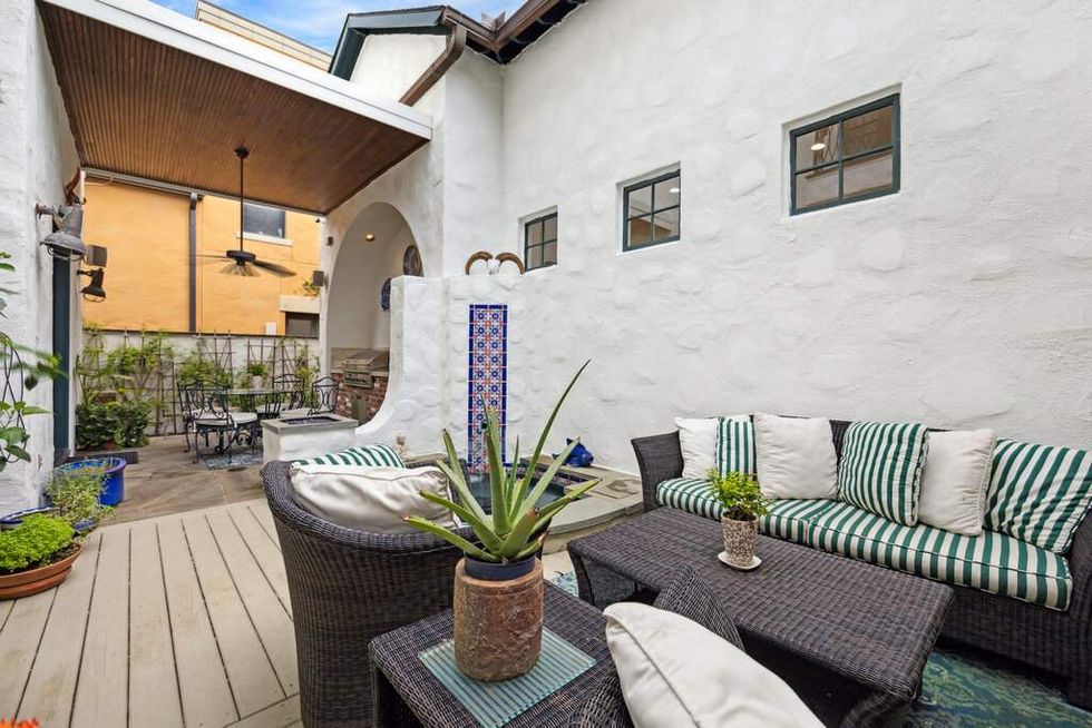 Backyard and gathering space at 3207 Sackett St.