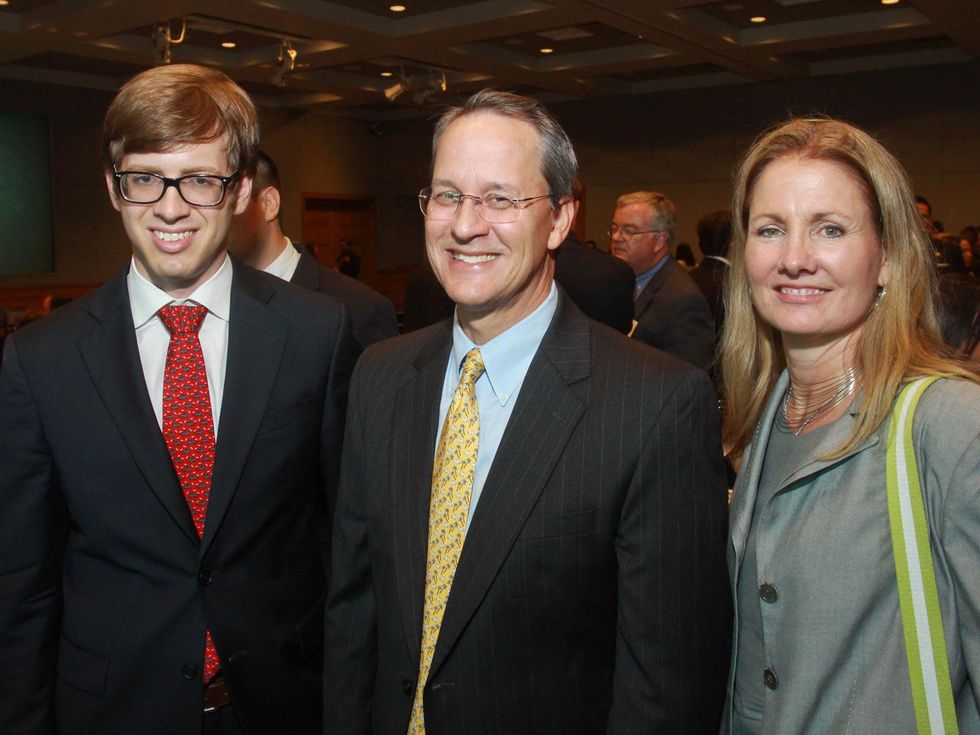 Baine Herrera, from left, George Grainger and Julie Long at the Emerging Leaders Institute 2013 class graduation.