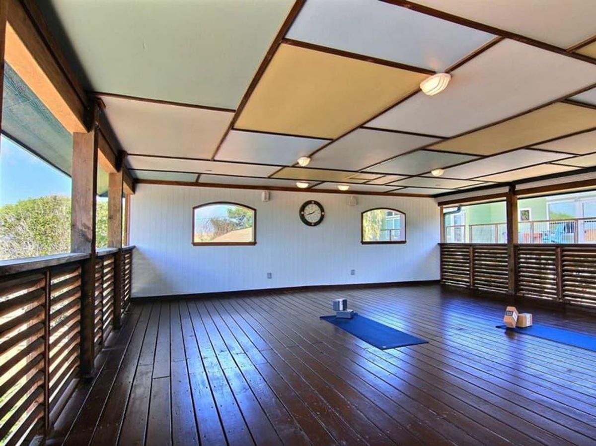 The Balinese Wellness Spa's outdoor yoga deck is a peaceful way to start your day. CultureMap