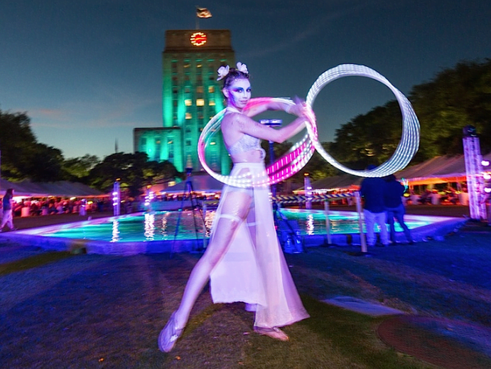 Bayou City Burlesque entertained around the City Hall reflection pool during the Legendary Art Car Ball