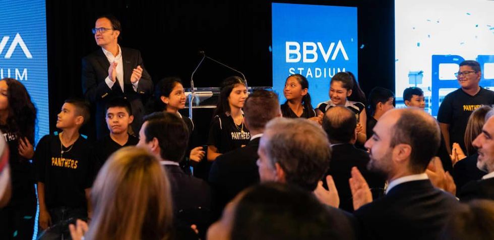 BBVA USA President and CEO Javier Rodriguez Soler officially announces the new BBVA Stadium name, with the help of Raul Yzaguirre Schools for Success Elite STEM Primary Academy soccer players