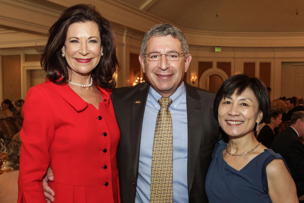 Betty Hrncir, from left, Dr. Paul Klotman and Dr. Hui Zheng at the Huffington Center on Aging luncheon October 2014