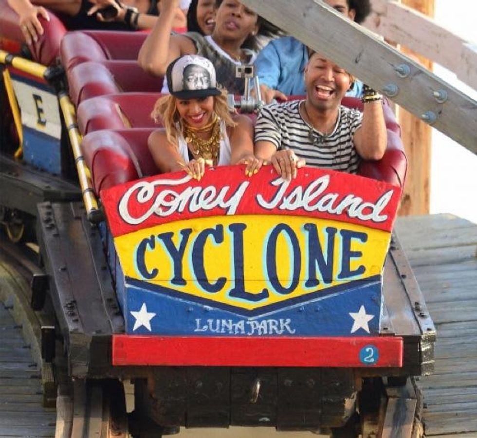 Beyonce at Cony Island riding The Cyclone rollercoaster August 2013