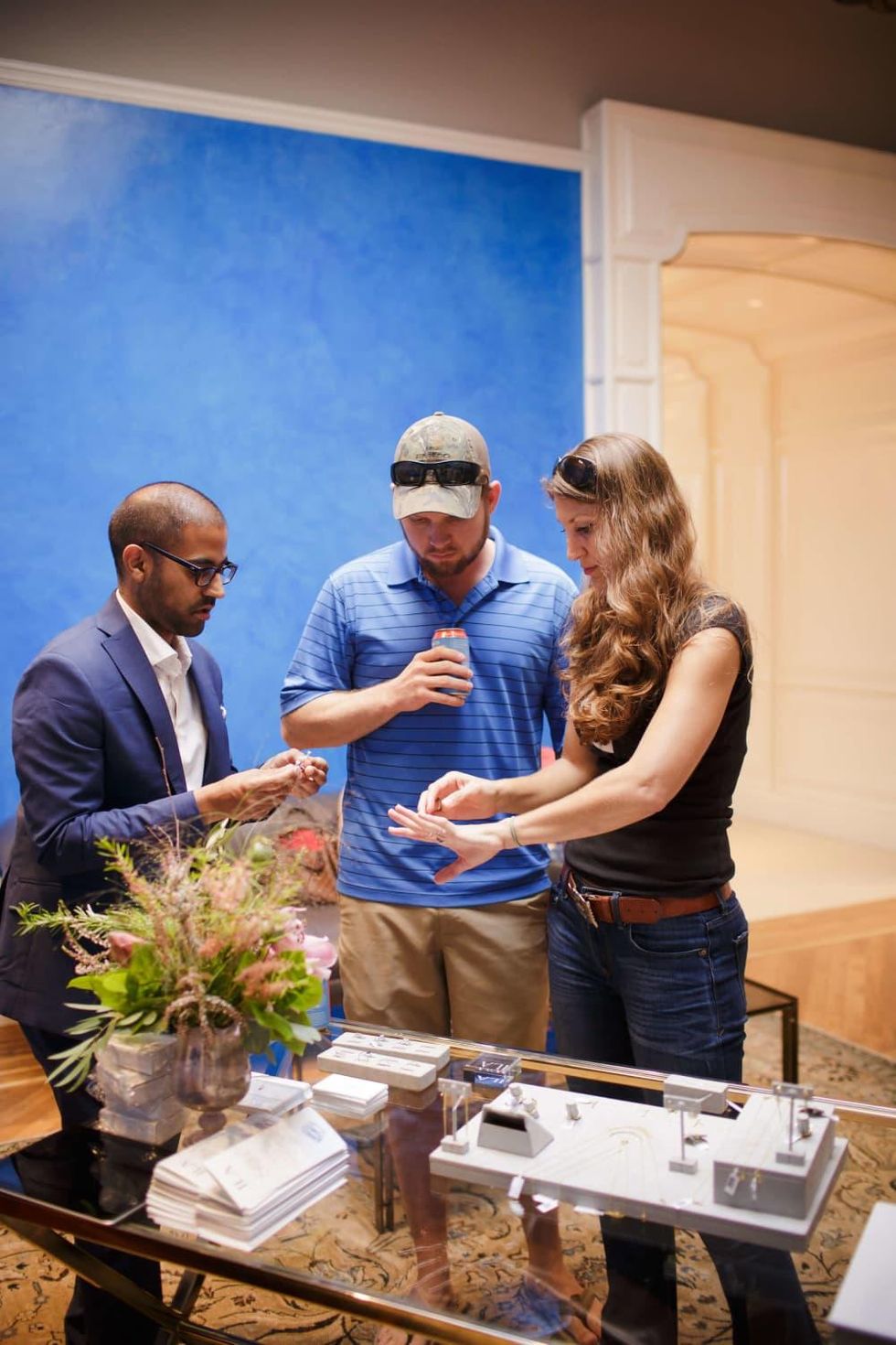 BHLDN ILA engagement event Vikas Sodhani helps a couple pick out a ring