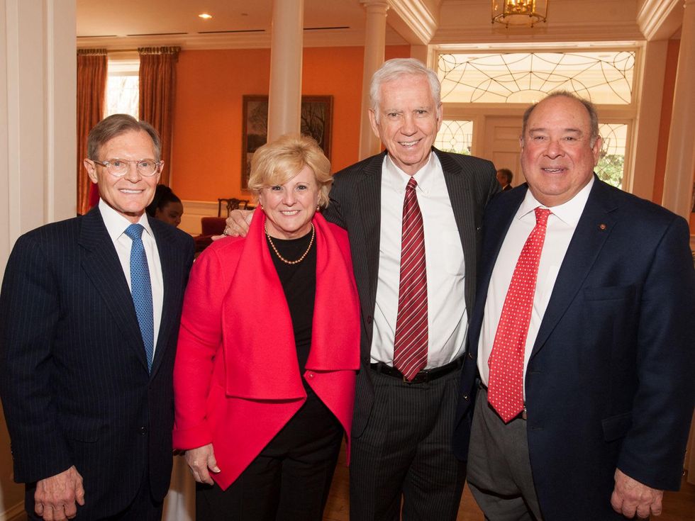 Bill Helms, from left, Paula Sutton, Charles Foster and Eduardo Aguirre at the Interfaith Ministries luncheon January 2014