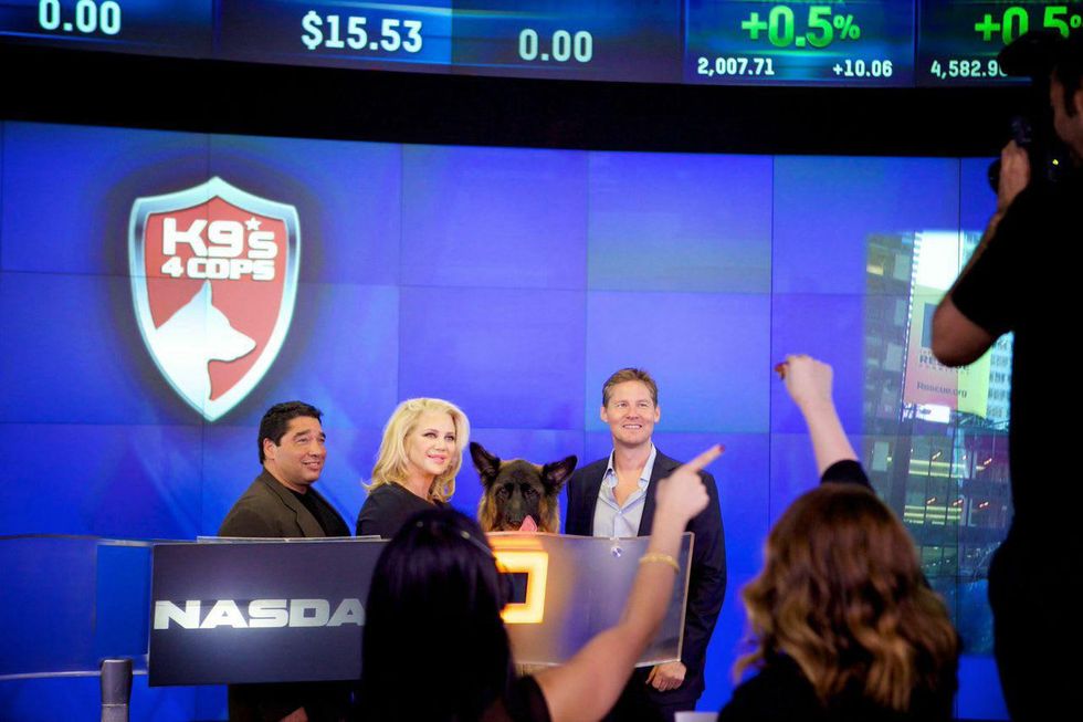 Bill Stanton, Kristi Schiller and Dave Zinczenko at NASDAQ bell ringing for K9s4Cops