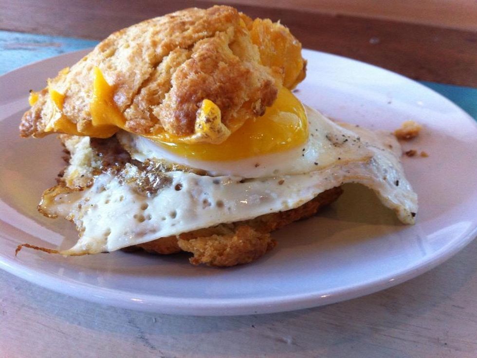 Blacksmith Houston scratch-made biscuits, freshly made sausage, ole dad farm's eggs and sharp cheddar