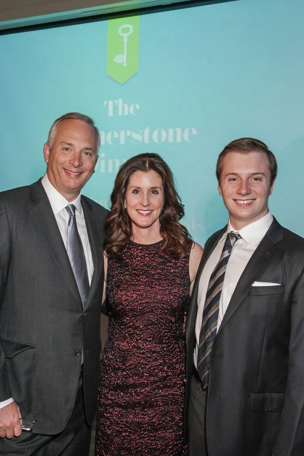 Bobby and Phoebe Tudor, left, with Harry Tudor at the Cornerstone Dinner February 2015