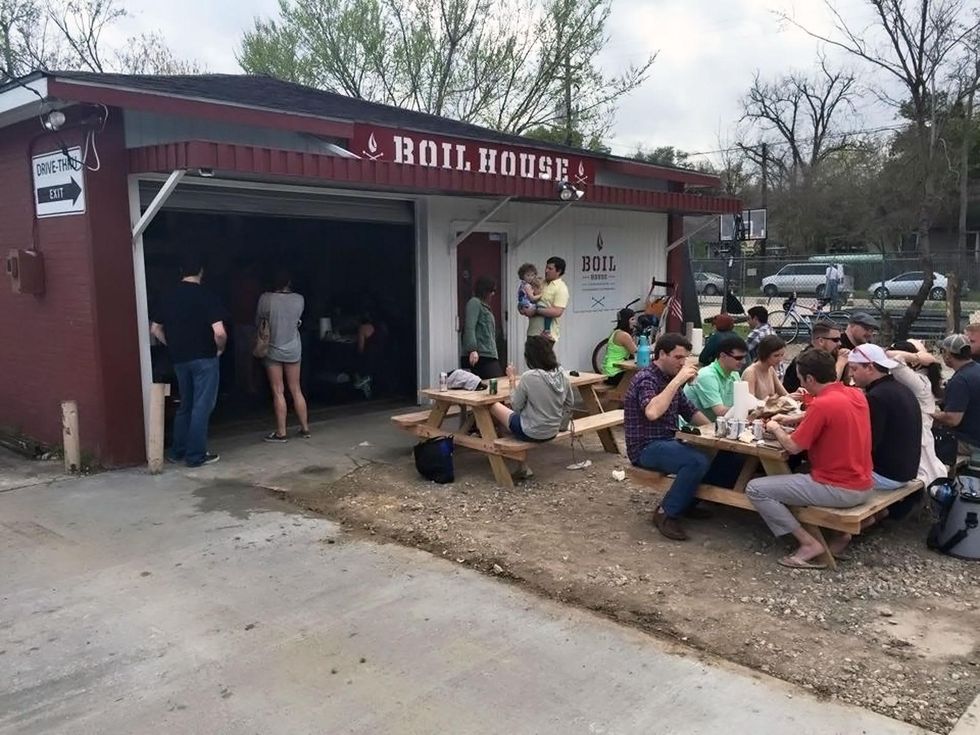 Boil House crawfish customers picnic tables