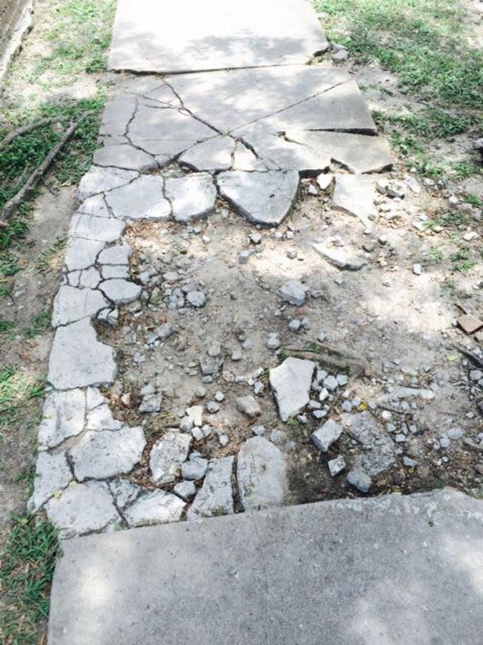 Broken sidewalks in Montrose July 2014