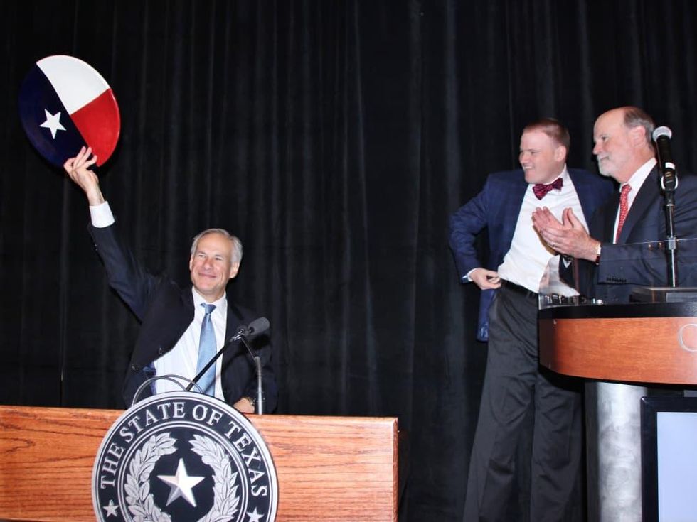 Brookwood luncheon, co-chair Brad Tucker with son Citizen Frank and Governor Greg Abbott