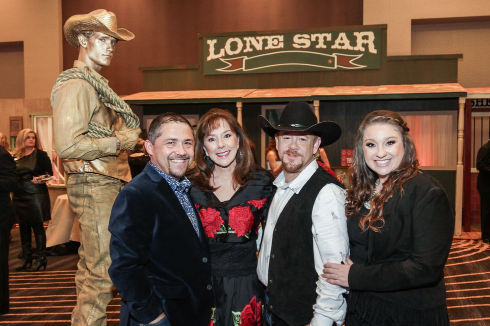 Bruce Padilla, from left, Elizabeth Stein, Shelby Kibodeaux and Laura Stein at the Citizens for Animal Protection Gala November 2014