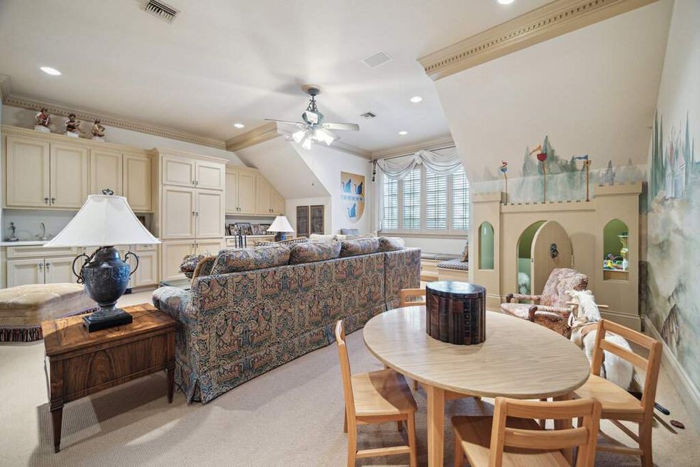 Built-in playhouse in an upstairs room of 412 Timberwilde Lane