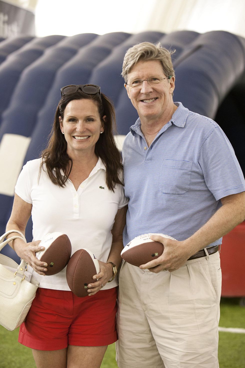 Cabrina and Steven Owsley at The Society for Leading Medicine Houston Texans Family Field Day May 2014