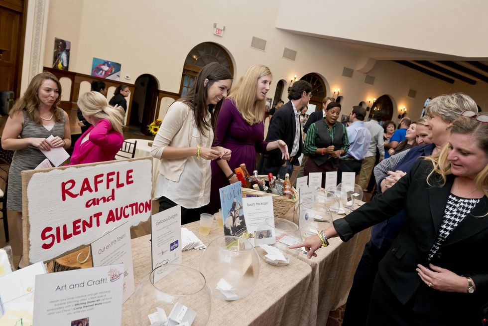 Camp Culinary Challenge Raffle and Silent Auction at the Camp for All event September 2014